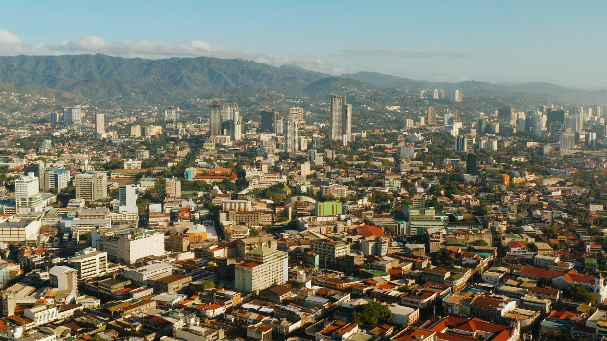 Cebu with skyscrapers and buildings during sunrise. Philippines